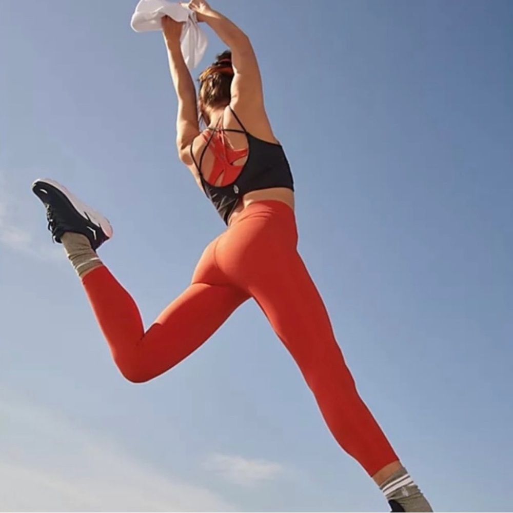 Free People Movement Black Free Throw Leggings in Garnet